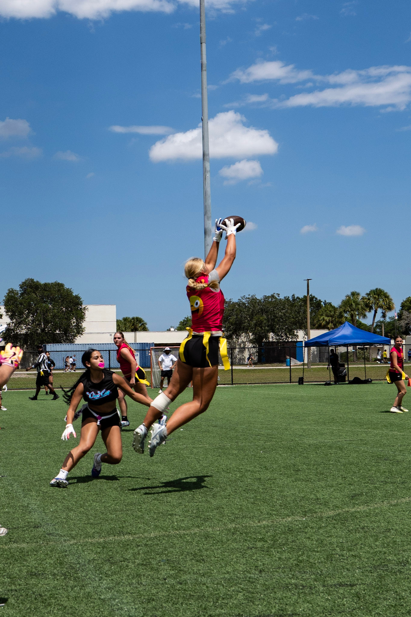 Girls flag football player at a Flag Elite event