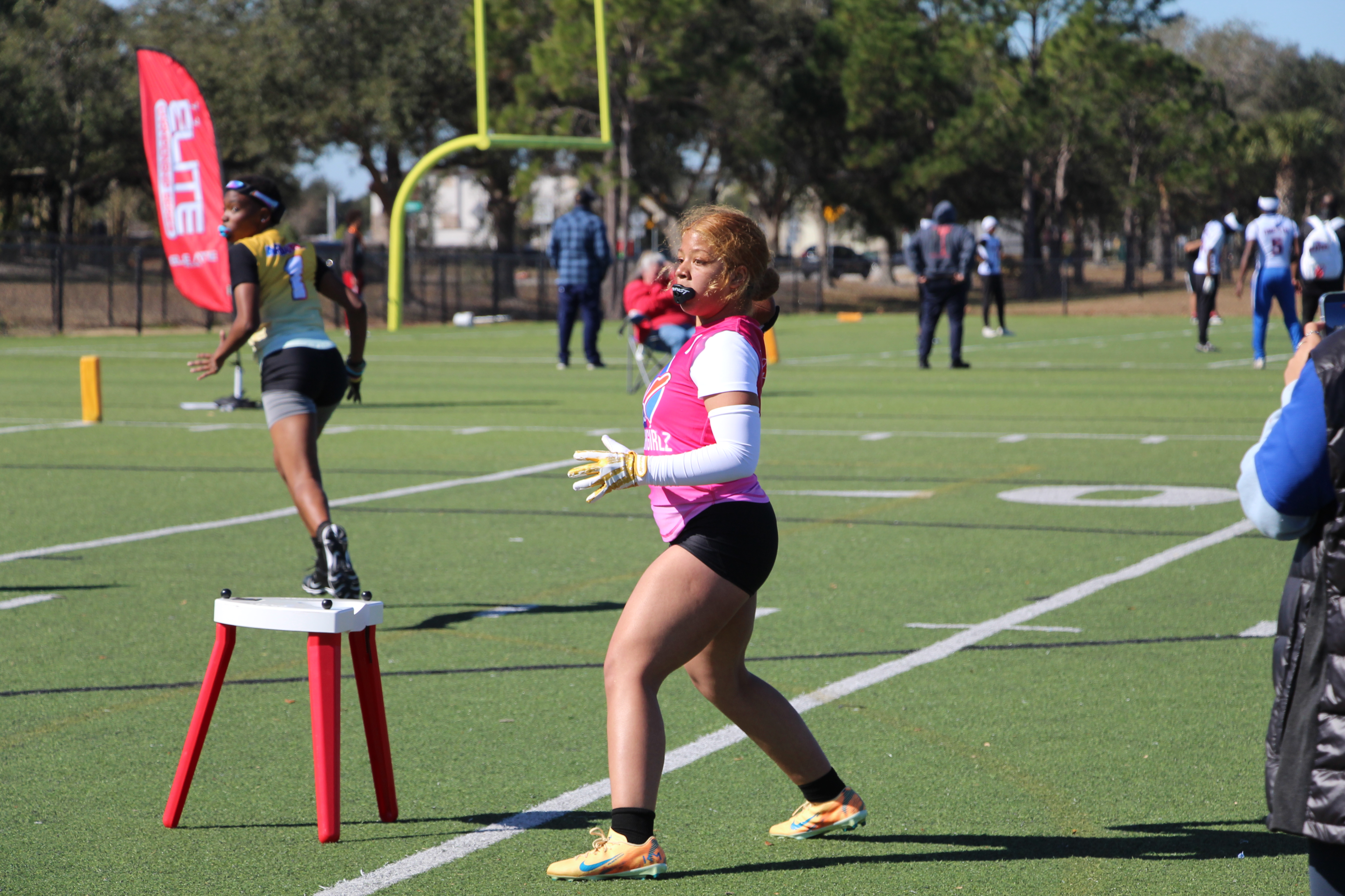 Girls flag football player at a Flag Elite event